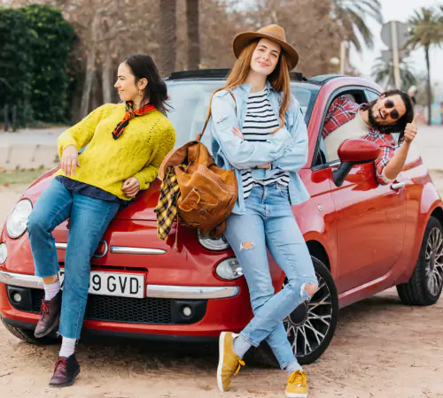 Tourists enjoying luxury car experience